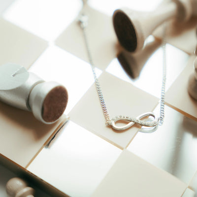 Bougie Bijou Noire, Fleur de Thé, Bracelet Argent Infinity